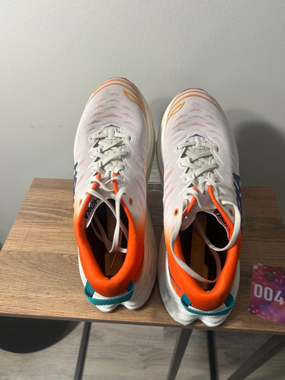 Hoka White Shoes with Orange Lining and Blue Logo - Picture 4 of 8